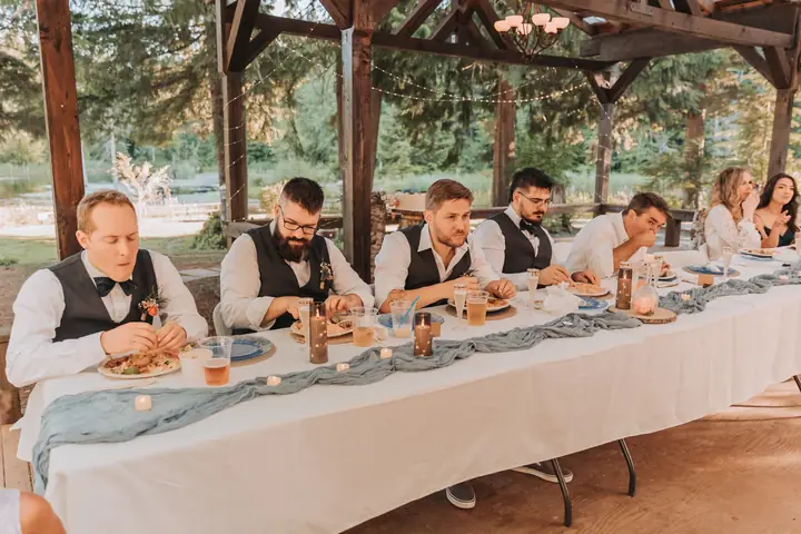 The head table under the patio chandelier