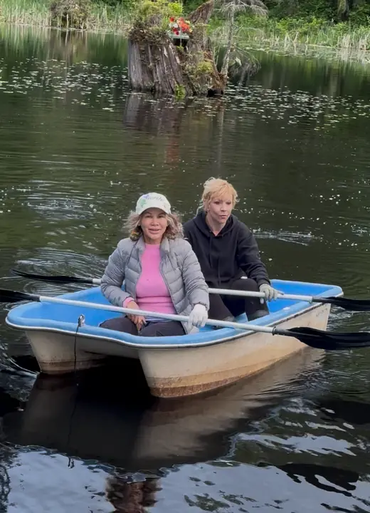 Ploenta and Heather rowing out on the lake, May