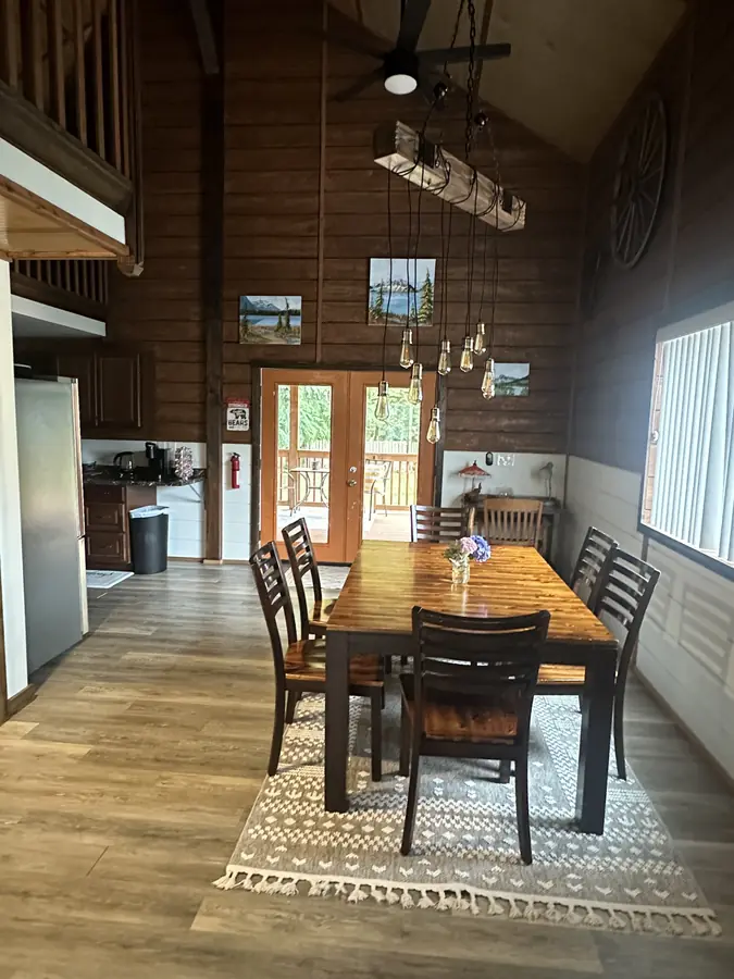 The kitchen and dining table, beneath the loft