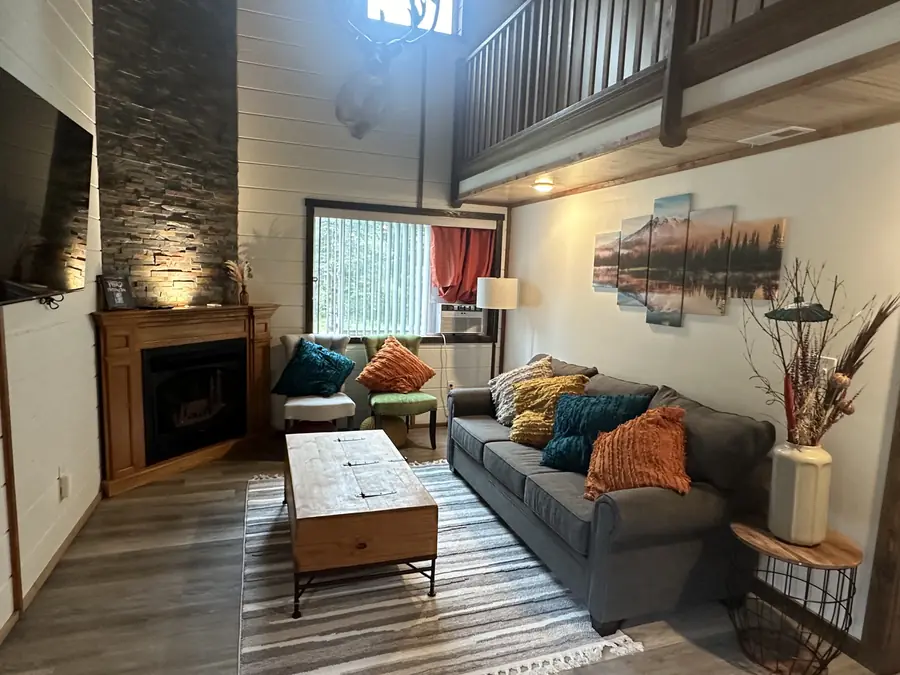 The living room sofa and fireplace