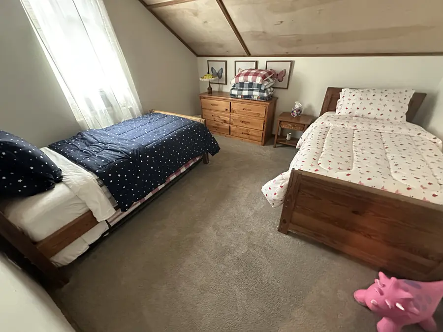 Two twin beds upstairs, perfect for kids