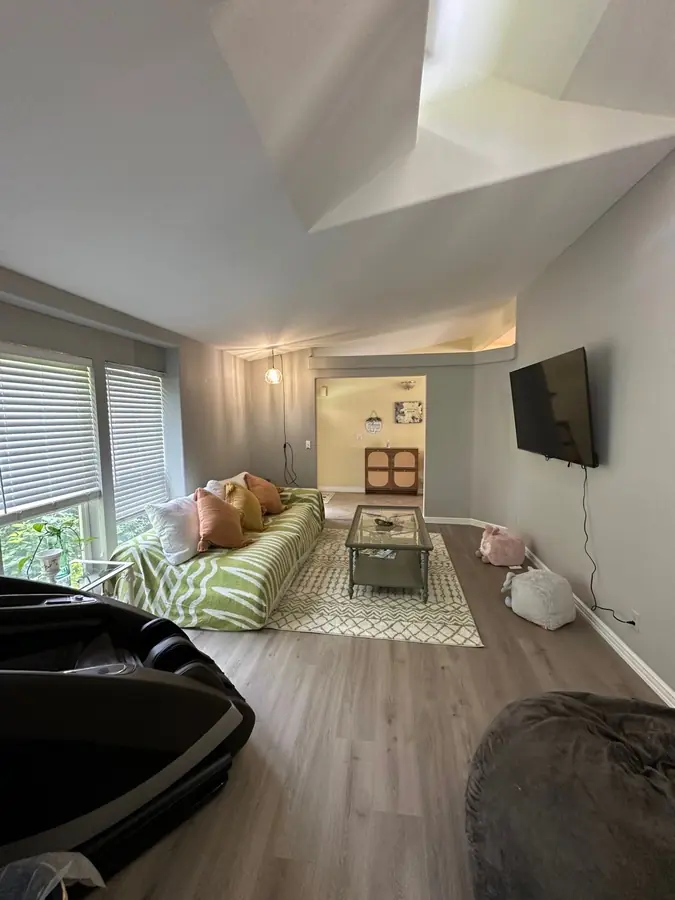 The family room, with a TV and a comfortable sofa